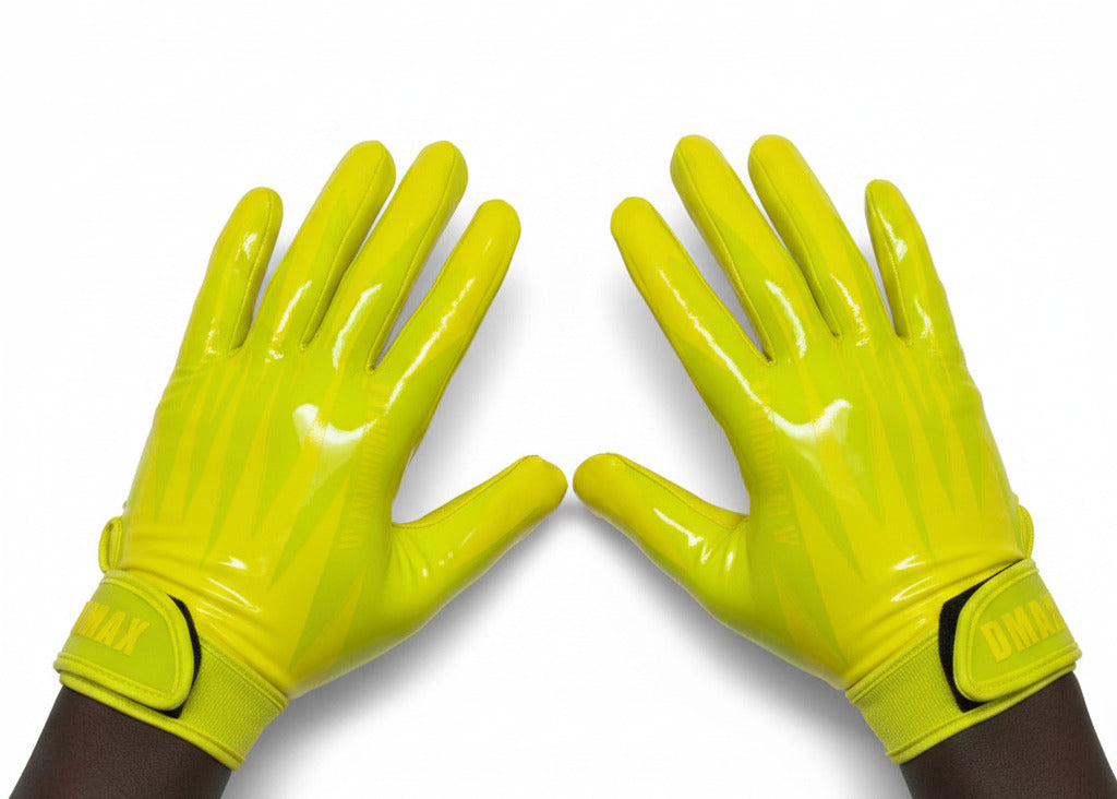 pair of yellow gloves on background