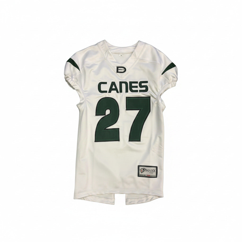 White sports jersey with green text and numbers on a dark background
